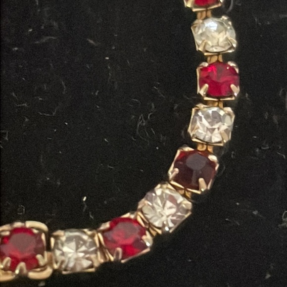 7.5” gold plated tennis bracelet with 38 prong set red and clear crystals - Picture 9 of 15